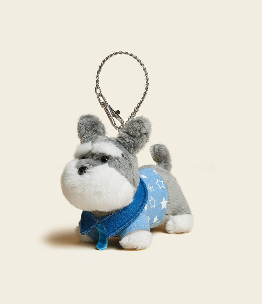 Handmade denim Schnauzer plushie bag charm with embroidered eyes and clip, adding playful texture to bags or backpacks.