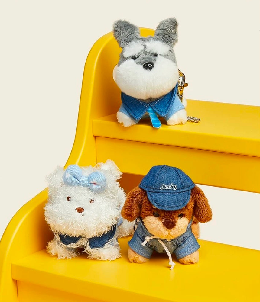 Handmade denim dachshund plushie bag charm with embroidered eyes and clip, adding playful texture to bags or backpacks.